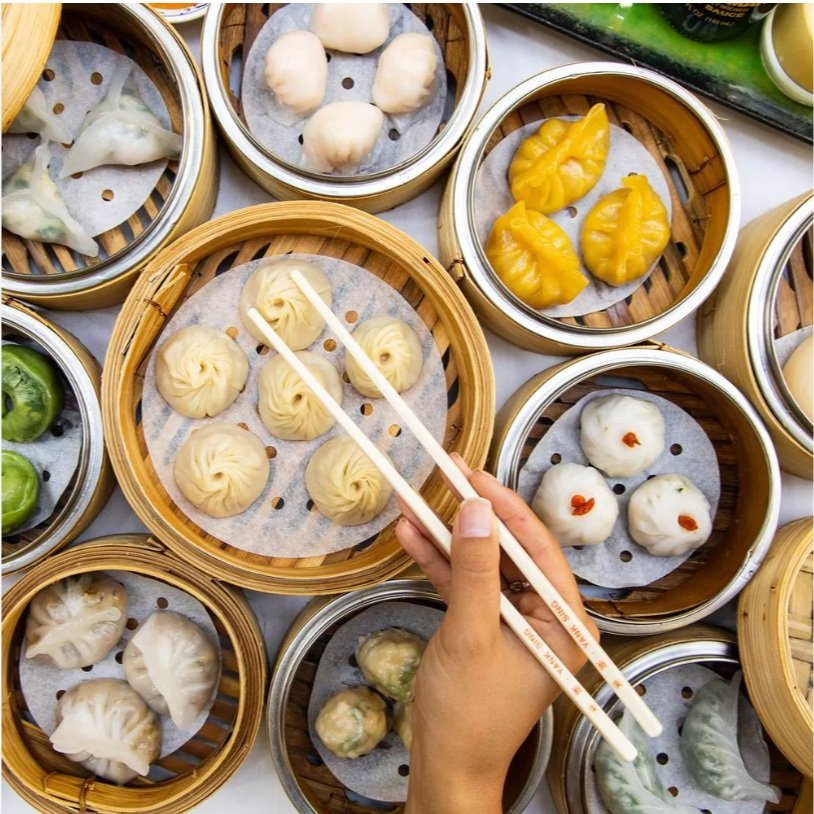 a bowl filled with different types of food on a table