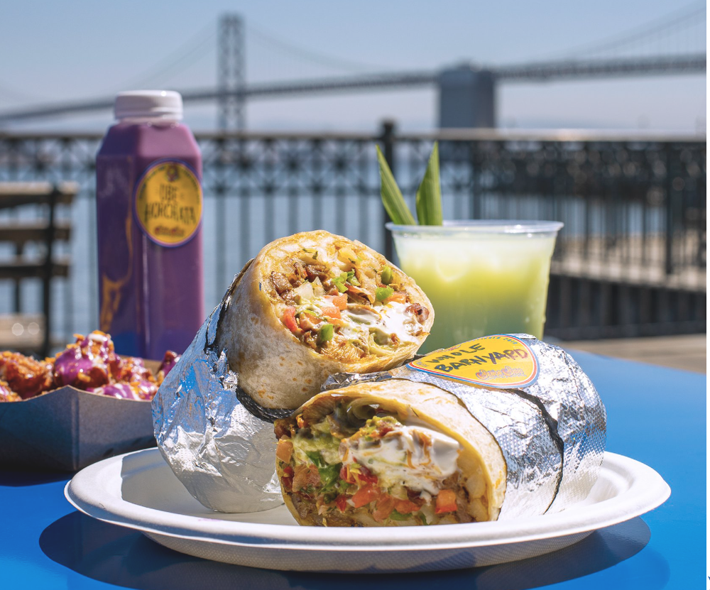 a plate of food on a picnic table