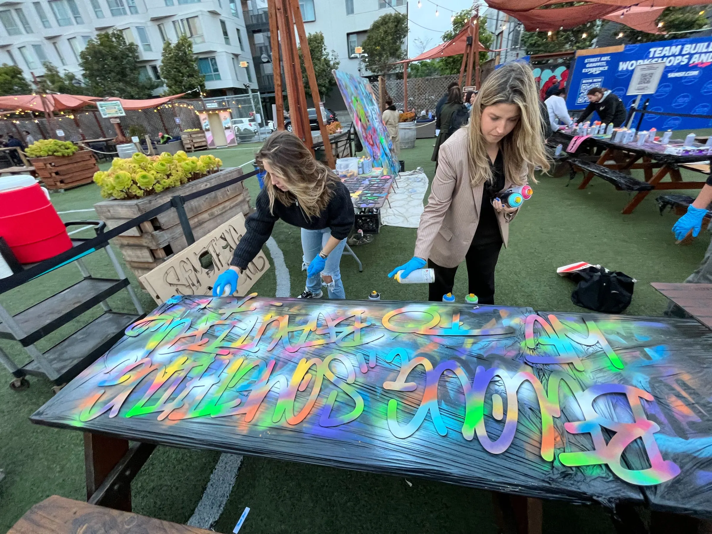 a group of colorful umbrellas sitting next to a person