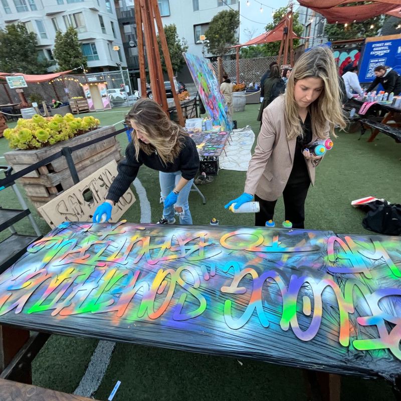 a group of colorful umbrellas sitting next to a person