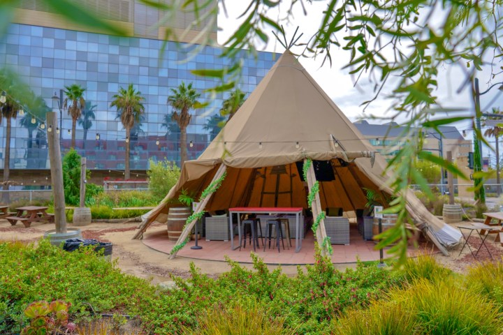 a building with a green umbrella