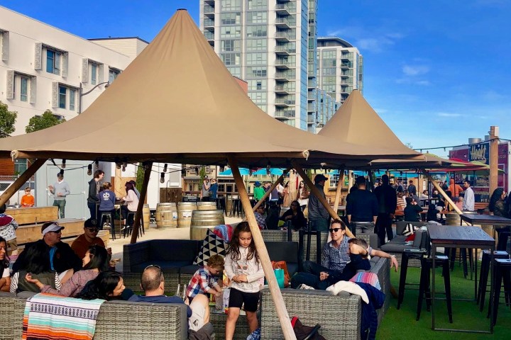 a group of people standing in front of a building