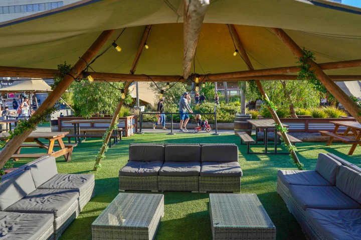 a table topped with lots of green grass