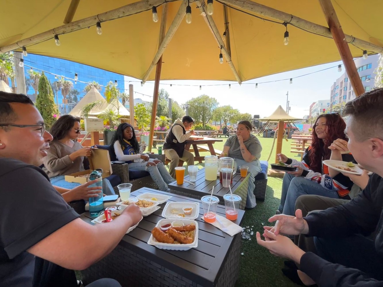 a group of people sitting at a table